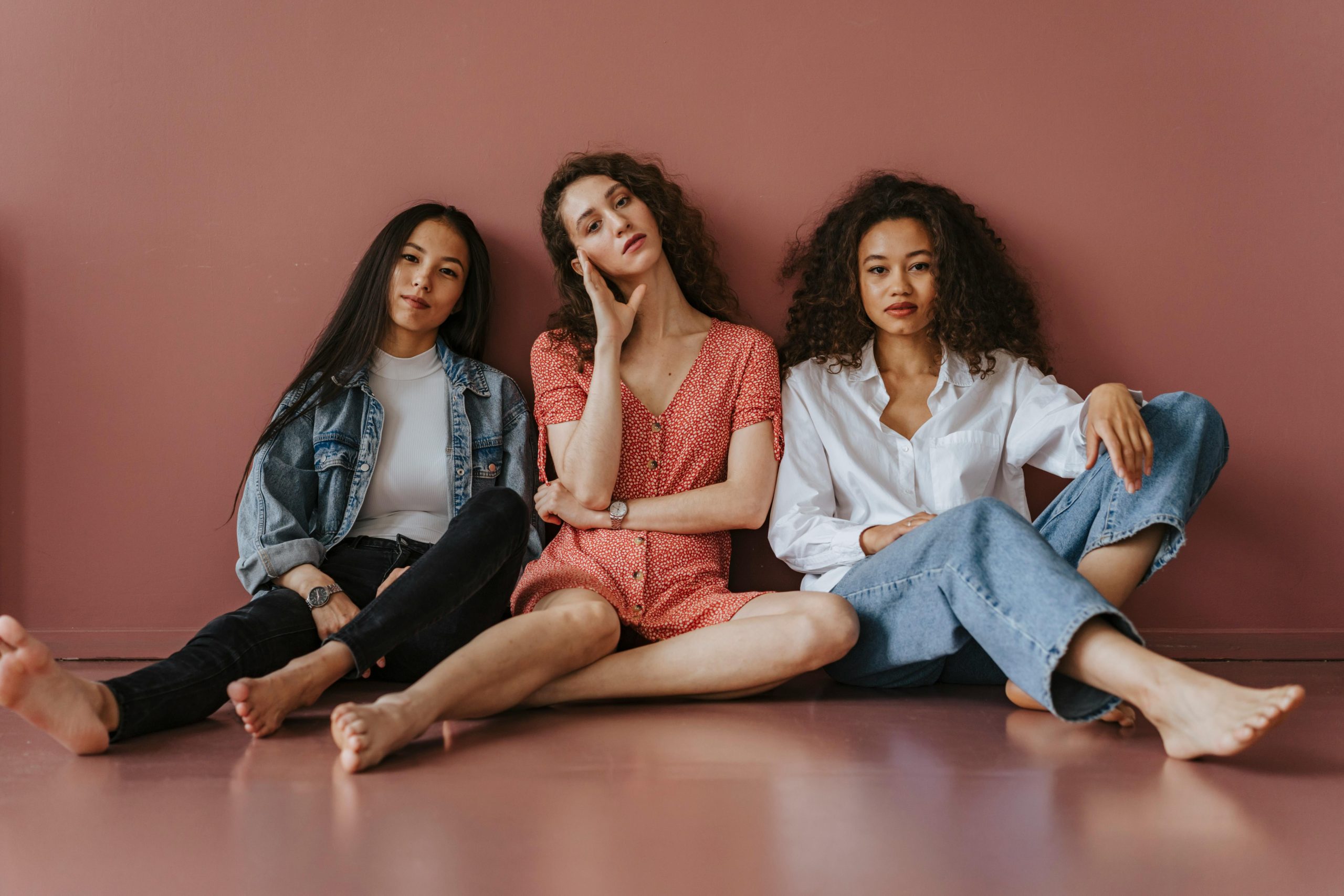 Photo by olia danilevich full-shot-of-women-sitting-on-the-floor
